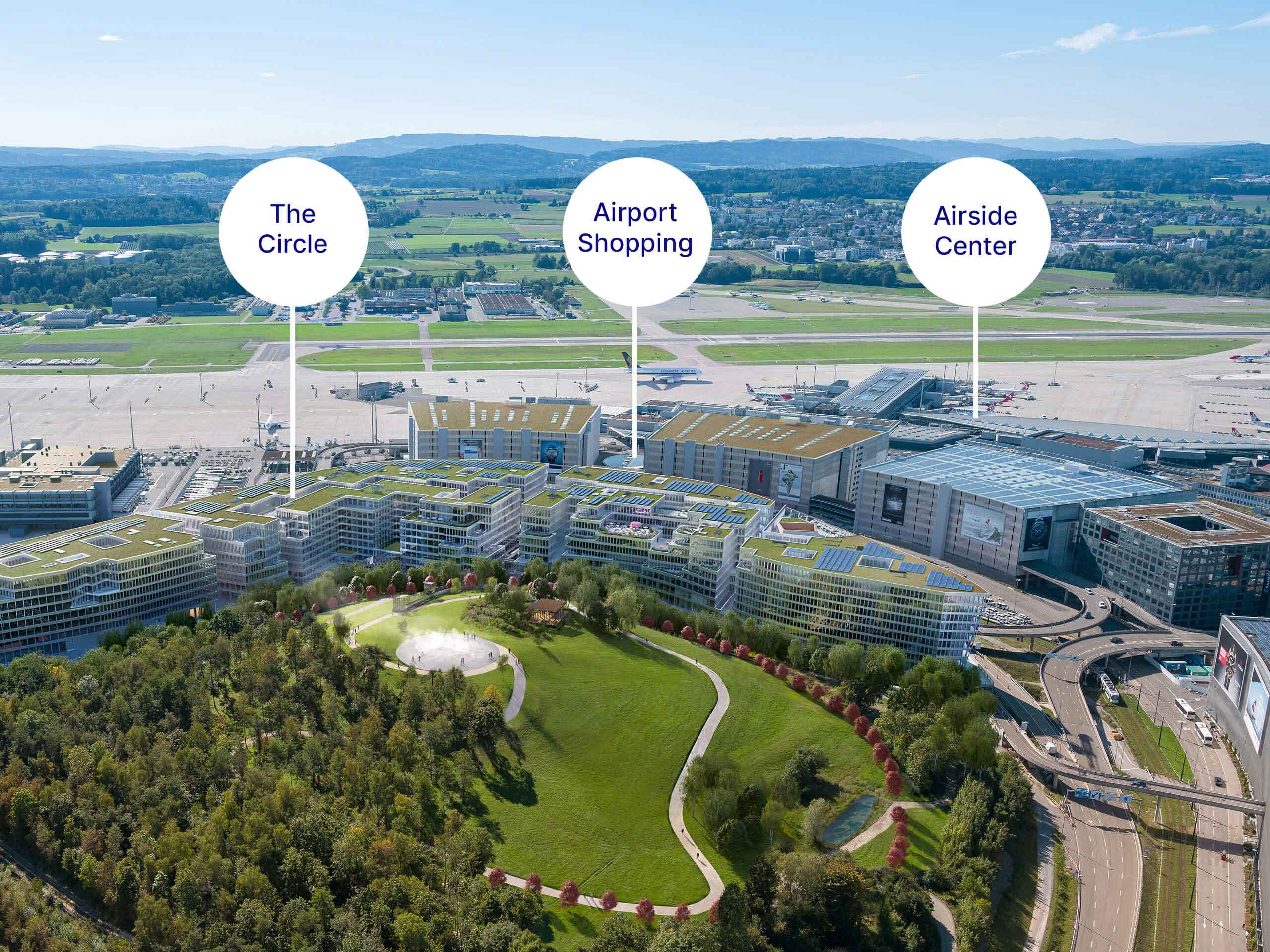 Das Bild zeigt eine Luftaufnahme des Flughafen Zürichs mit den drei Bereichen The Circle, Airport Shopping und Airside.