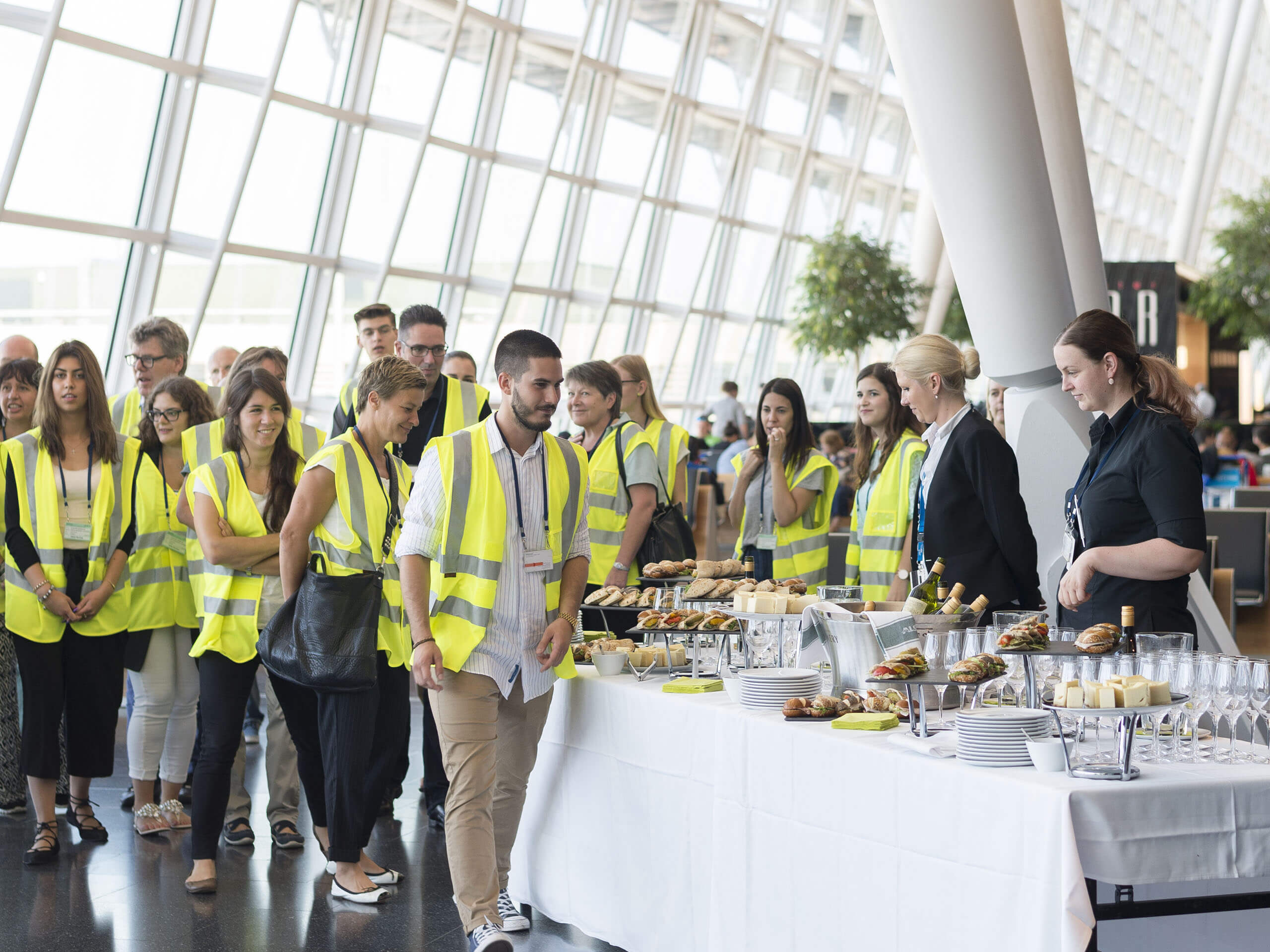 Group of people having aperitif at Zurich Airport